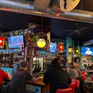 people sitting at the bar
