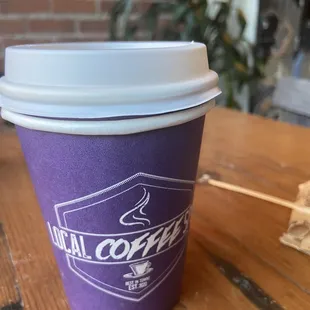 purple cup with white lid