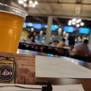 Creative shot of a beer and thier card