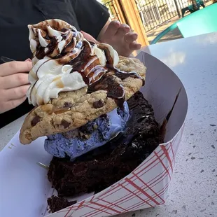 a chocolate chip cookie and ice cream sundae