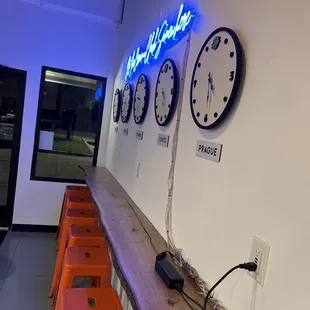 a row of orange stools