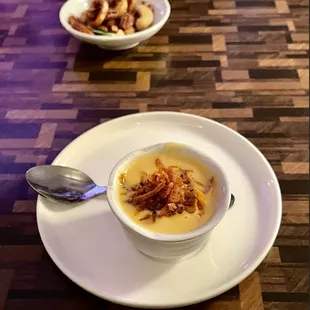 Amuse Bouche, roasted butternut squash soup + crispy carrots
