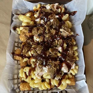 LOADED TOTS!!! Pulled pork, slaw, mac n cheese on tots.