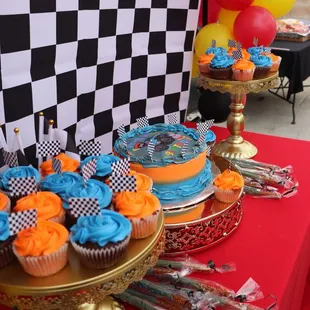 Balloon installation and cupcake stands