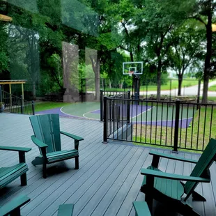 Beautiful outdoor sitting area. There is a small basketball court for shooting a few balls and a volleyball area. April 2024