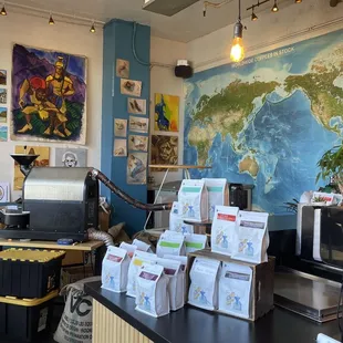 a coffee shop with a map on the wall