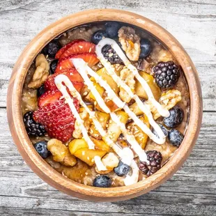 Baked Apple Grain Bowl - Coconut Milk Steel Cut Oats, Local Baked Cinnamon Apples, Mixed Berries, Pecans, Greek Yogurt, NC Honey