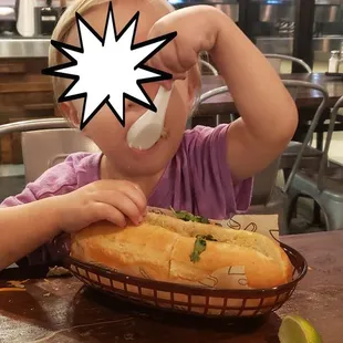 My son loved his pork meatball banh mi. His preferred method of eating it was to use a soup spoon to scoop out the insides.