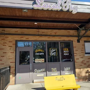 a bench in front of a store