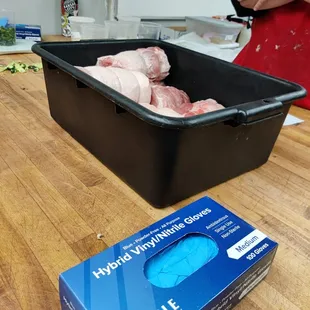 a woman preparing a meal in a kitchen