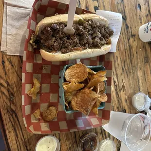 Philly cheesesteak with ranch, barbecue and garlic, mayo on the side. The chips are made in house and we&apos;re very tasty.