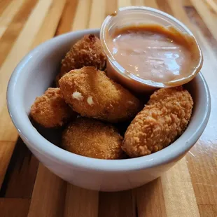 a bowl of fried chicken nuggies