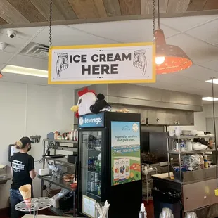 a sign that says ice cream here