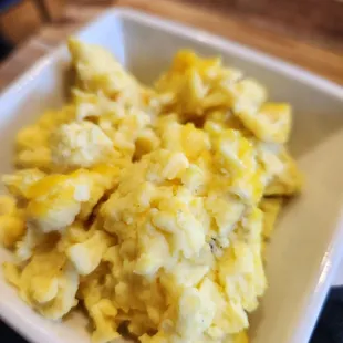 scrambled eggs in a white bowl
