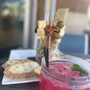 a drink and bread on a table