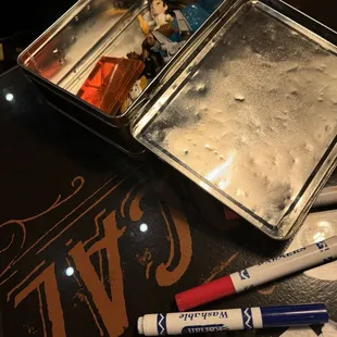 Cute tin of trinkets they brought to the table