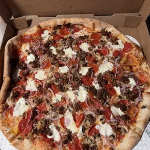 Pepperoni, sausage, mushroom, and red onion.