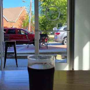 a pint of beer on a table