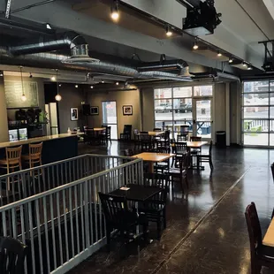 Socially distanced tables and chairs in taproom at LocAle Brewing Company (Mankato, MN)