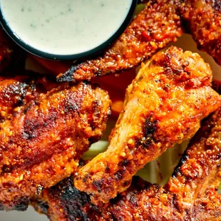 Wood-fired wings! These  locally sourced wings are amazing. Don't forget a house made dip to go with it!