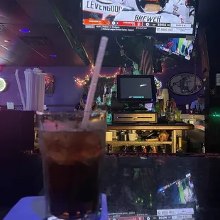  a drink on a table in a bar