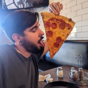 Just a massive piece of pepperoni as big as my head .