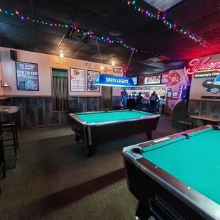 Separate game area. Large tables up front for groups of 6-8