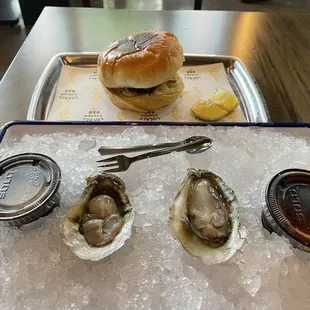 Fried fish sandwich and a couple of raw oysters.