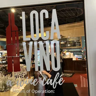 the front window of a wine shop