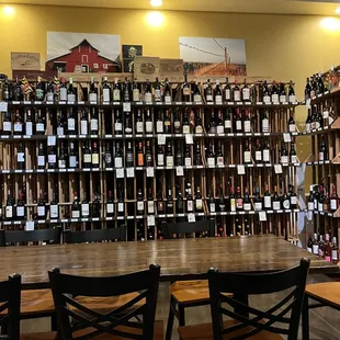rows of wine bottles on shelves