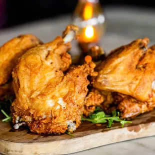 fried chicken on a cutting board