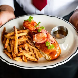 a man holding a plate of food