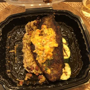 Blackened catfish with rice, beans and zucchini