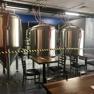 a row of beer tanks