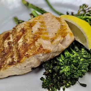 a piece of meat and broccoli