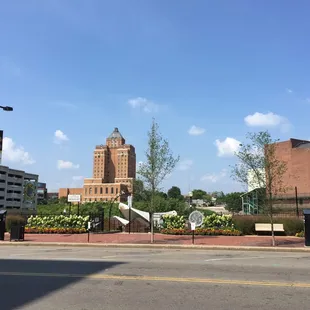 a view of a city with a clock tower in the background