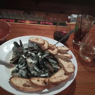 Menu mussels. Crowd.favorite. with a white wine cream sauce similar to Alfredo. Tasty.