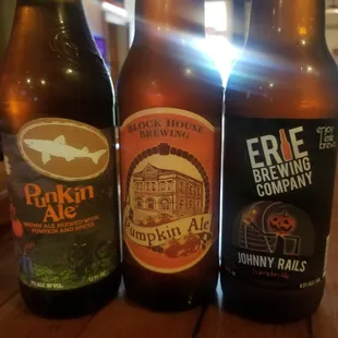 three bottles of beer on a table