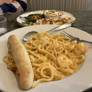 Lobster sauce with shrimp on fettuccine.  Love this dish
