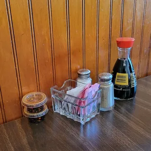 Condiments on the table-- We liked that the chili sauce was in its own small containers