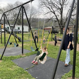 Nice swings made from pipe with rubber below so no mud