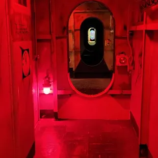 Hallway leading to room.