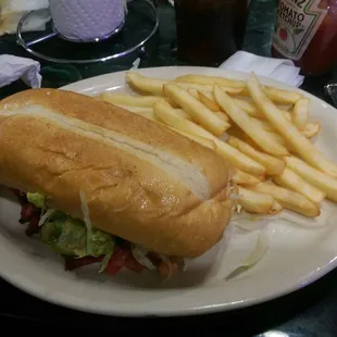 torta w/ al pastor meat and fries
