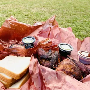 a picnic basket full of food