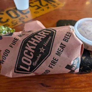 Brisket, sausage, jalapeno popper + potato salad