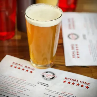a glass of beer on a table