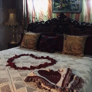 Rose petals on the bed, this bed was super comfortable!