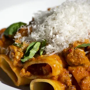 a pasta dish with meat and cheese