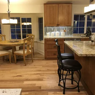 Kitchen table seating for 4 plus island seating for two.