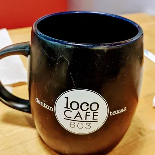 a coffee cup on a table